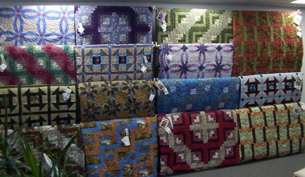 A sneak peek at the Quilts display at the NEW shop of Long Meadow Farms Quilts