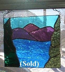 View the Lake through the Pines Stained Glass Window Panel by Long Meadow Farms